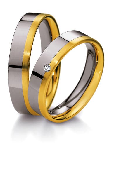 Trauringpaar Breuning Variation — Bicolor Weiß- und Gelbgold mit einem Brillanten